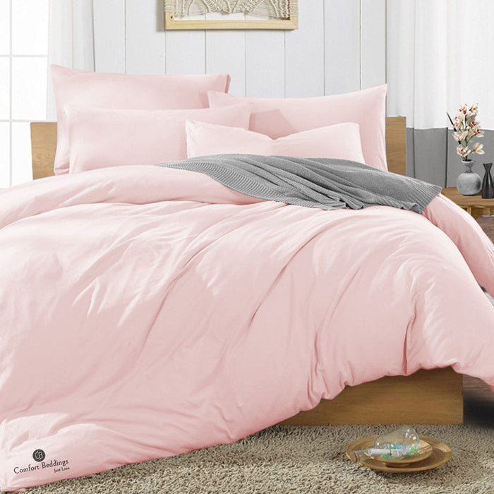 Blush duvet cover on a neatly made bed