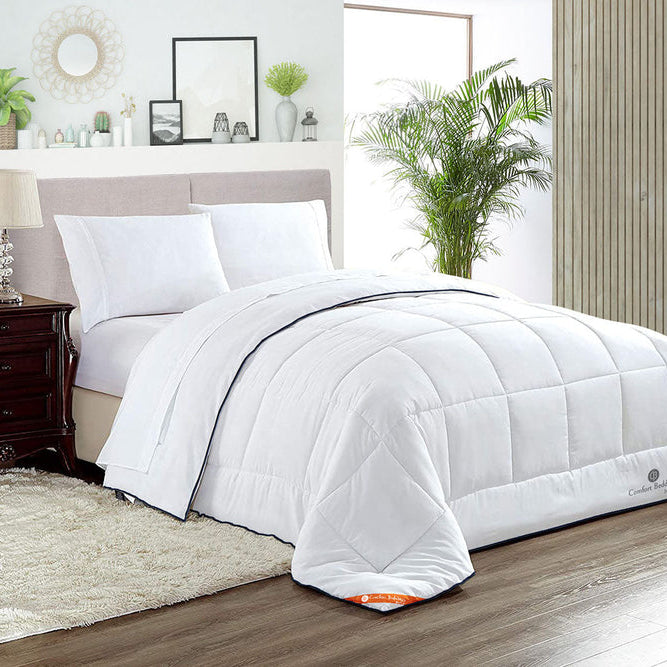 Comfort Beddings comforter on a bed